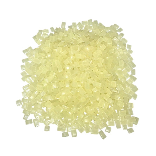 Pile of Pale Amber Biodegradable Hot Melt Pellets